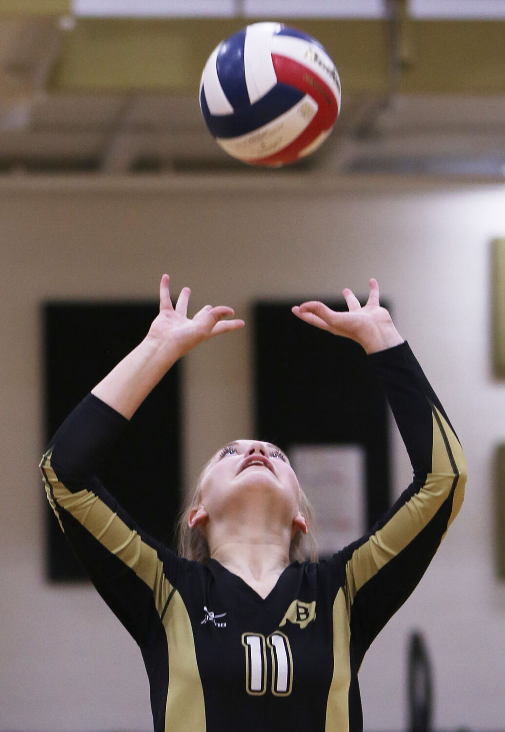 Cassie Downare waits for the ball to fall for her set
